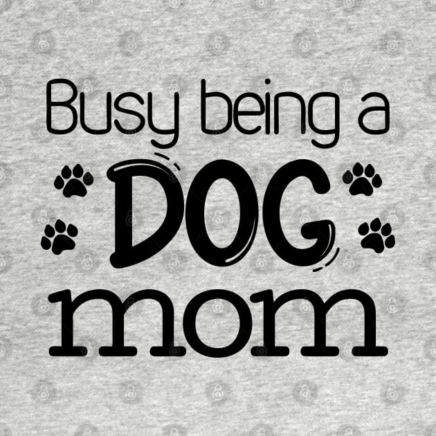 Busy being a dog mom by OgogoPrintStudio